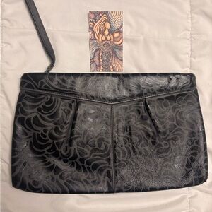 Hand painted one of a long grey and black clutch purse.